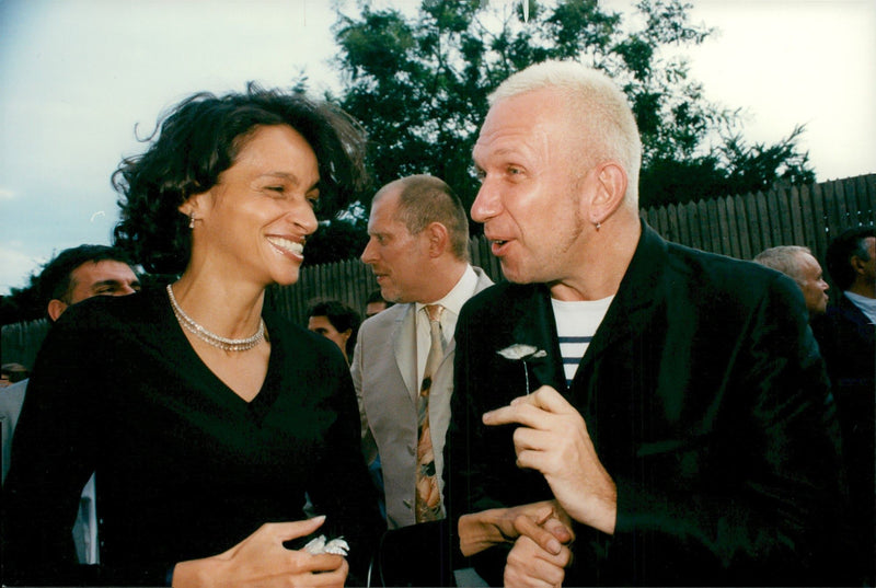 Jean-Paul Gaultier in concert with Farida Kelfa during a cocktail party - Vintage Photograph