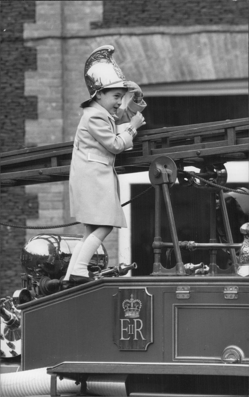 Prince William dressed to firefighter and ready to help - Vintage Photograph