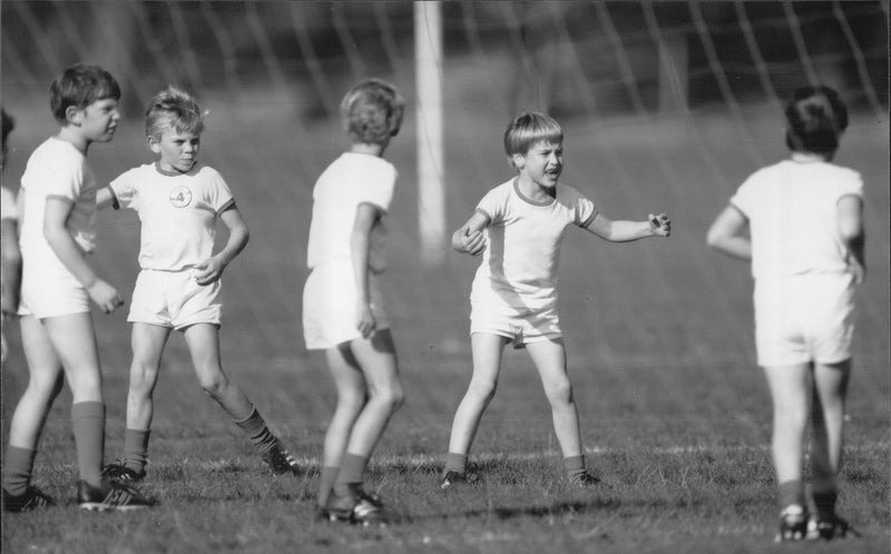 Prince William plays football with his classmates - Vintage Photograph