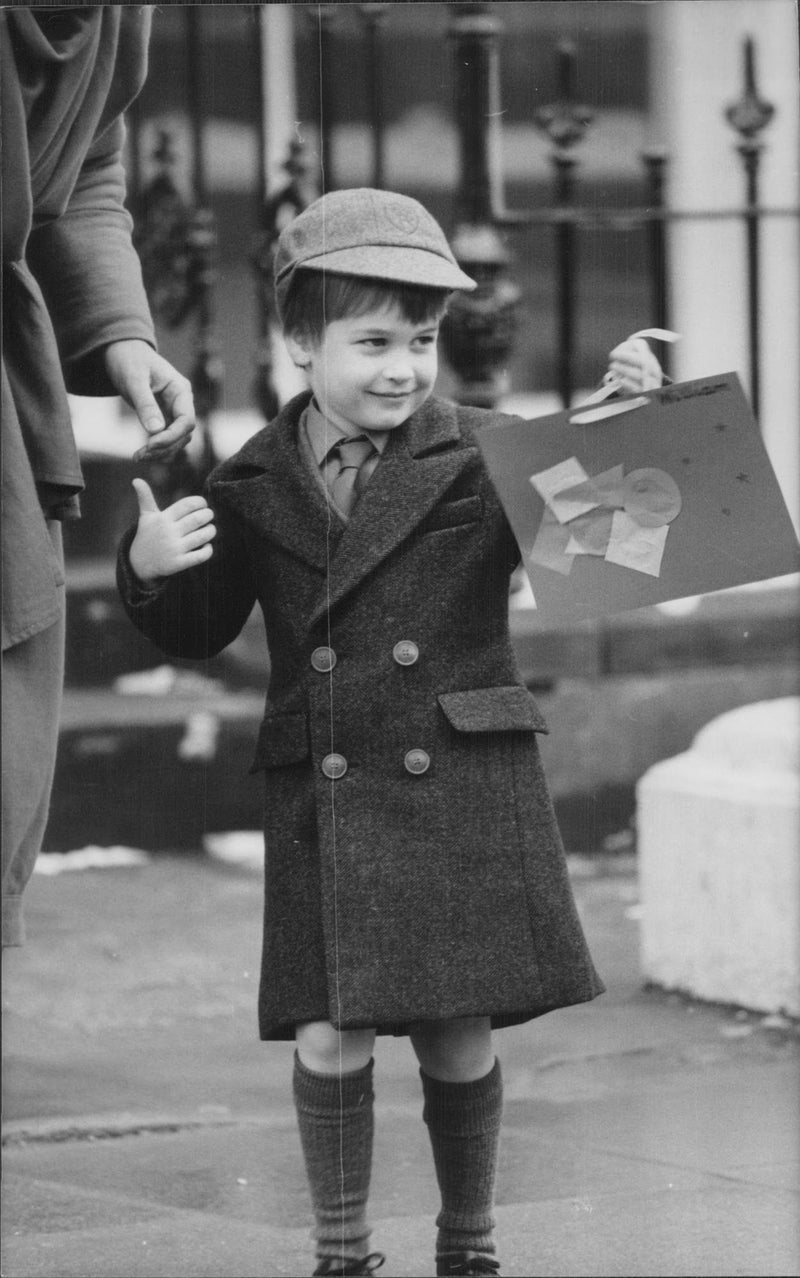 Prince William proudly displays a picture he has made at school - Vintage Photograph
