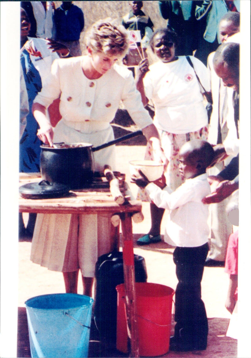 Princess Diana serves food - Vintage Photograph