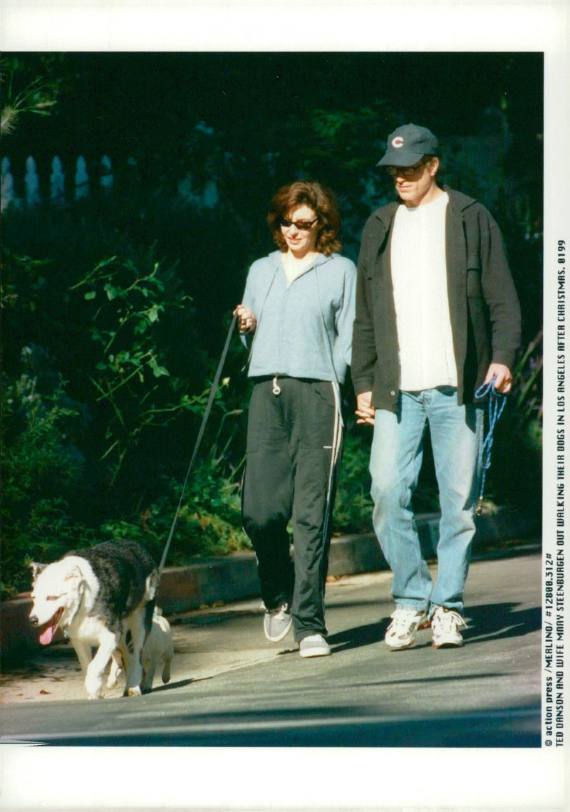 Ted Danson and Mrs Mary Steenburgen on a walk with their dogs - Vintage Photograph