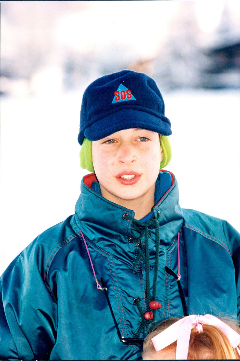 Prince William photographed at his ski holiday in Klosters, Switzerland. He celebrated New Year and had a vacation there with his father Prince Charles and Brother Prince Harry. - Vintage Photograph