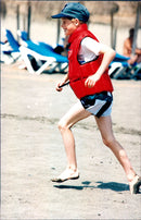 Prince Harry is on holiday in Marbella, Spain, together with his brother Prince William and mother princess Diana. One day at the beach. - Vintage Photograph