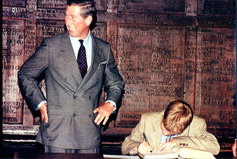 Prince Harry with his father Prince Charles under his written appeal - Vintage Photograph