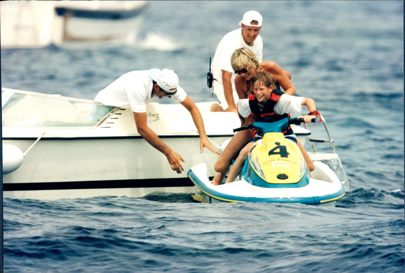 Prince Harry with his mother Princess Diana on watercraft - Vintage Photograph