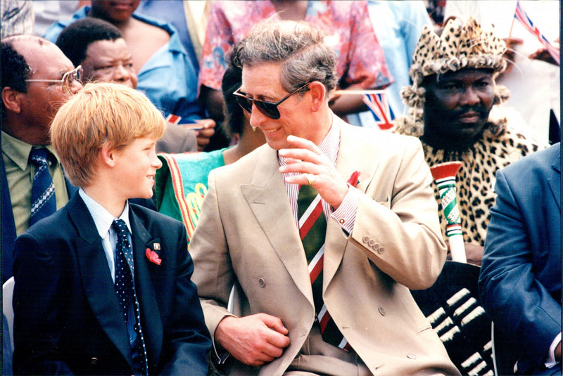 Prince Harry with his father Prince Charles on display of a Zulu ritual - Vintage Photograph