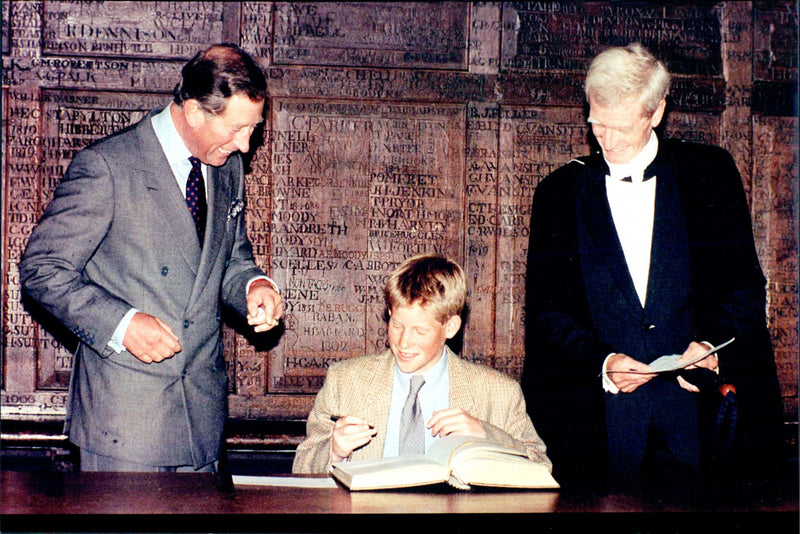 Prince Harry with his father Prince Charles under his written appeal - Vintage Photograph