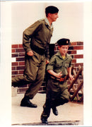 Prince Harry tries on life as a military. - Vintage Photograph