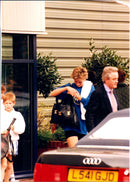 Paparazzi Picture of Prince Harry and Princess Diana taken in an unknown context. - Vintage Photograph