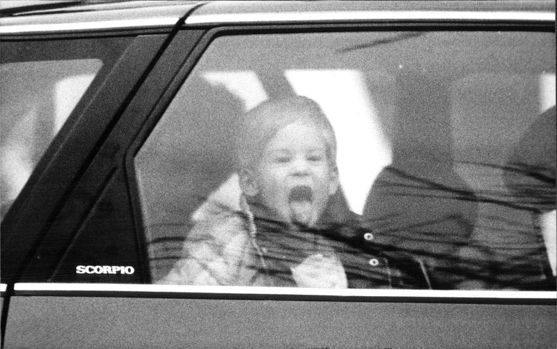 Prince Harry stands out his tongue - Vintage Photograph