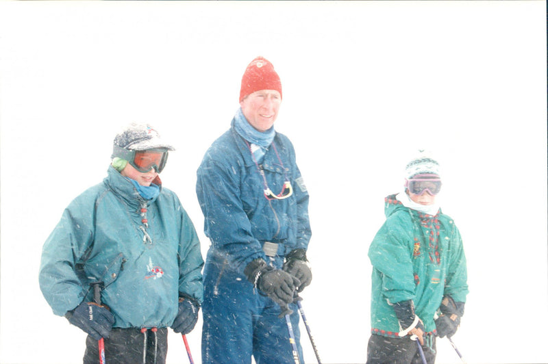 Prince Charles with the sons William and Harry in the ski slope - Vintage Photograph