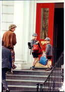Princess Diana leaves by Prince Harry in school. - Vintage Photograph