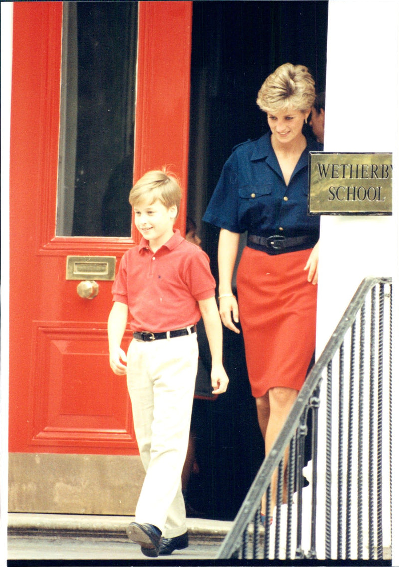 A proud mom, Princess Diana, retrieves his eldest son, Prince William in school. - Vintage Photograph