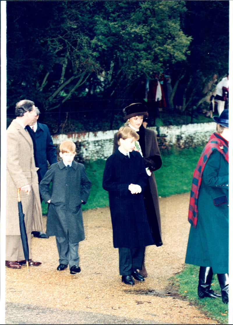 There was no kindness between Prince Charles and Princess Diana when they left the church in Sandringham together with the sons. - Vintage Photograph