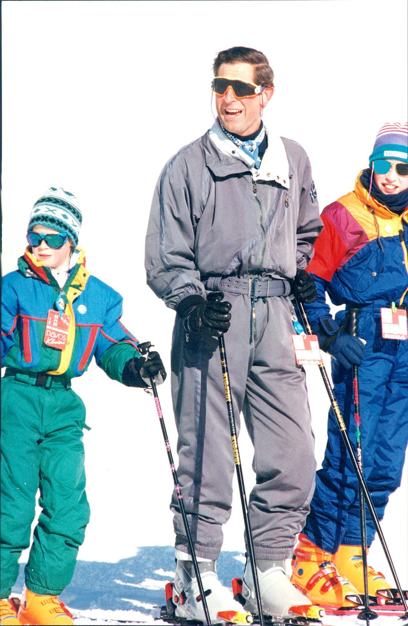 Prince Harry, Prince Charles and Prince William at a skiing holiday in the Swiss Alps. - Vintage Photograph