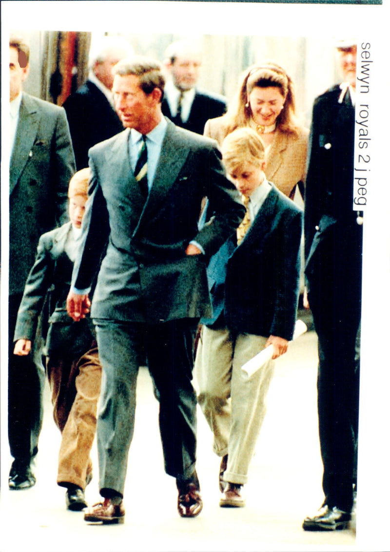 Prince Charles with the sons Prince Harry and Prince William at an official mission in Scotland. - Vintage Photograph