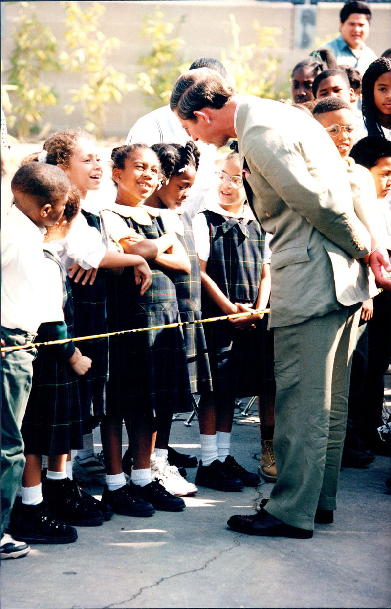 Prince Charles is talking to the students during his visit to Crenshaw High School - Vintage Photograph