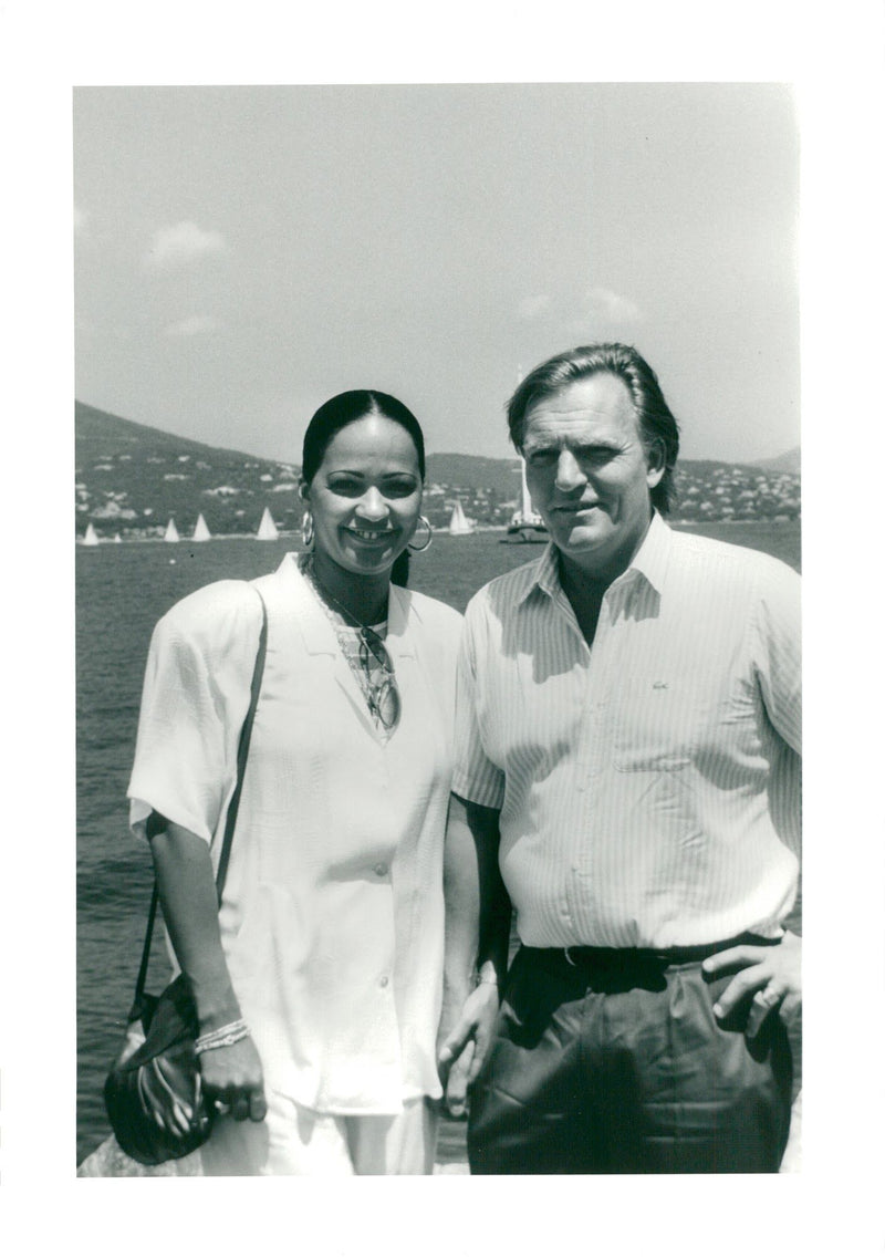 Portrait image of Edouard-Jean Empain and his wife Jacqueline de Passer taken at their villa in St. Tropez. - Vintage Photograph