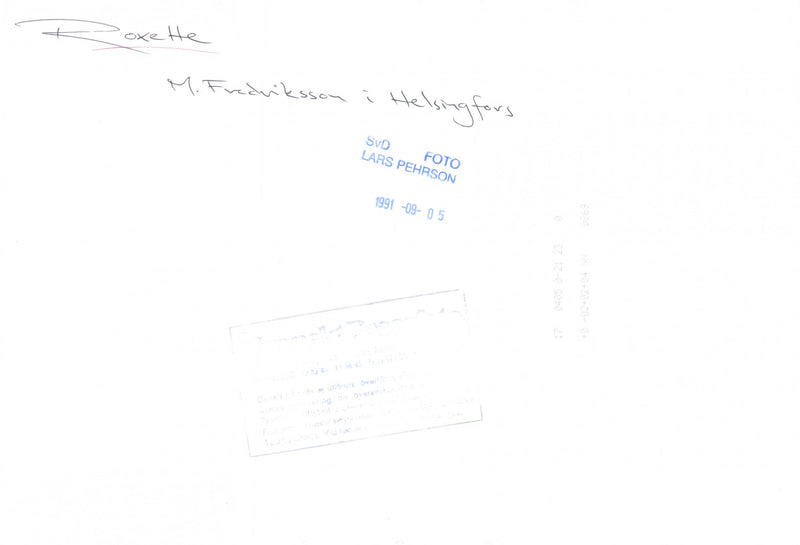 Marie Fredriksson in Roxette writes an autograph - Vintage Photograph