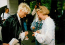 Marie Fredriksson in Roxette writes an autograph - Vintage Photograph