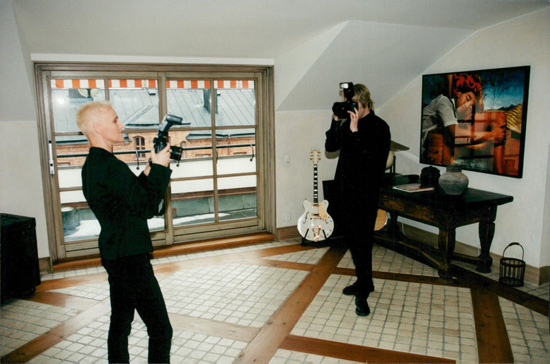 Marie Fredriksson and Per Gessle in Roxette photograph each other - Vintage Photograph