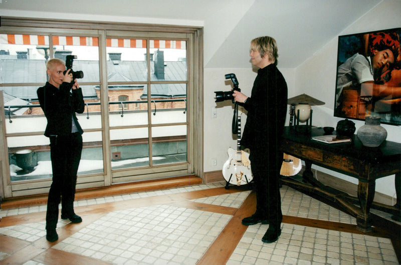Marie Fredriksson and Per Gessle in Roxette photograph each other - Vintage Photograph