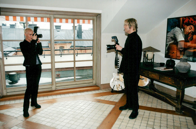 Marie Fredriksson and Per Gessle in Roxette photograph each other - Vintage Photograph