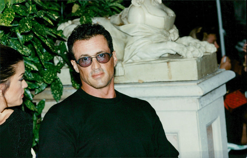 Janice Dickinson and Sylvester Stallone were honors at the Gianni Versace 25th Anniversary. - Vintage Photograph