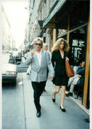 Rod Stewart music artist with Rachel Hunter - Vintage Photograph
