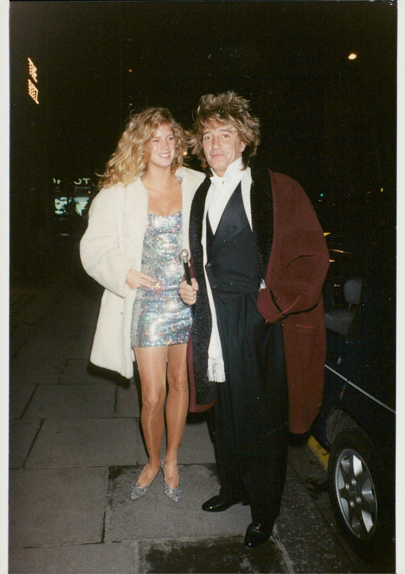 Rod Stewart and Rachel Hunter out in town - Vintage Photograph