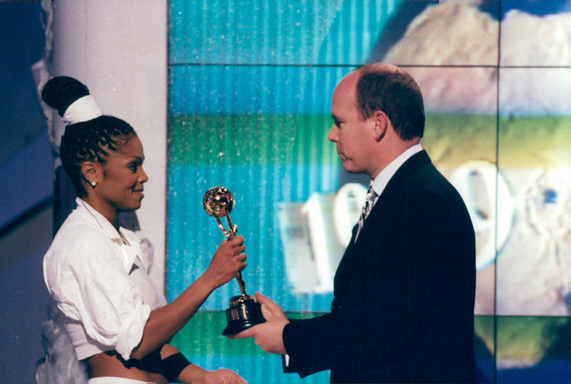 Janet Jackson receives her award of Prince Albert of Monaco at the Monte Carlos Music Awards - Vintage Photograph