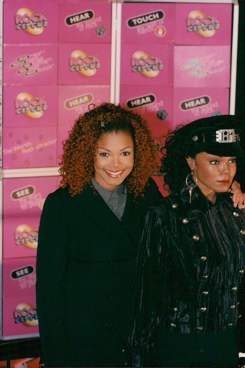 Janet Jackson is photographed with her wax doll at Rock Circus - Vintage Photograph