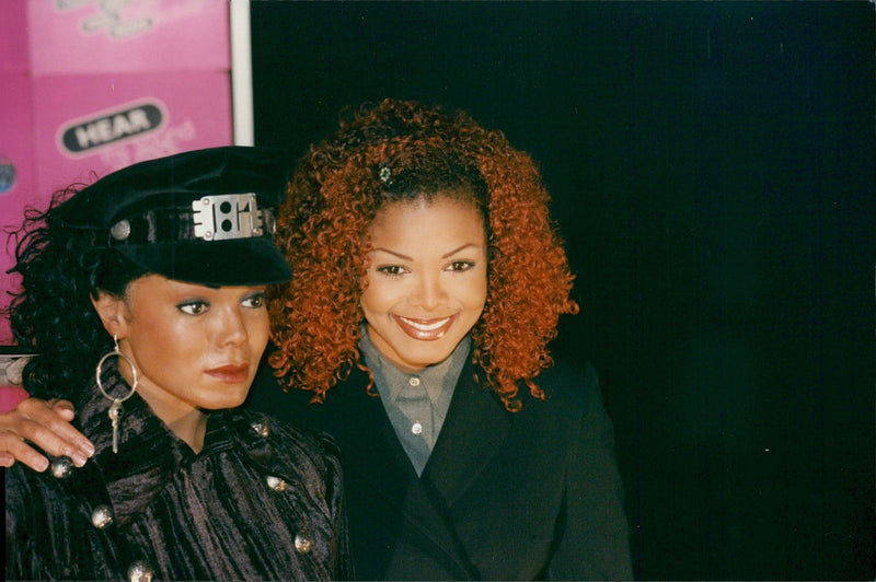 Janet Jackson is photographed with her wax doll at Rock Circus - Vintage Photograph