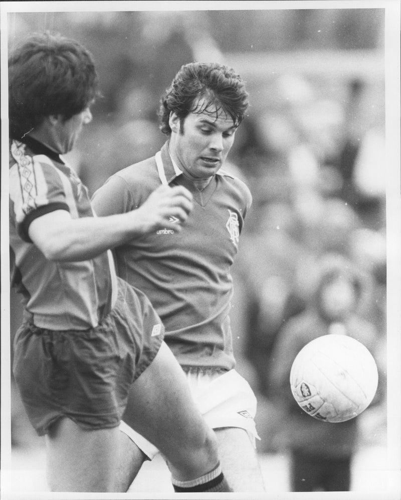 Football player Derek Johnstone is signed and is now playing with Rangers. - Vintage Photograph