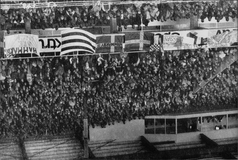 Bajen fans in the UEFA Cup match at a snowy and cold RÃ¥sund Stadium - Vintage Photograph