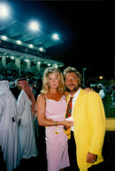 Rod Stewart and Rachel Hunter in Dubai - Vintage Photograph