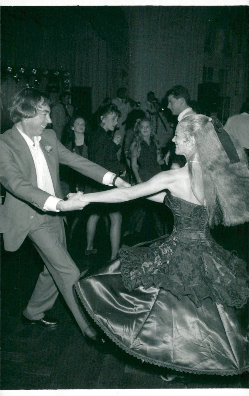 Composer Andrew Lloyd Webber is dancing with Karen Lowe from the musical fantasy of the opera - Vintage Photograph