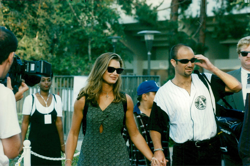 Brooke Shields and boyfriend Andre Agassi arrive at the charity event &quot;An Evening at the Net&quot; - Vintage Photograph