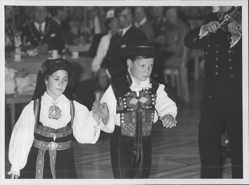 Crown Prince Haakon shows Norwegian folk dance in connection with the British Queen Elizabeth II visit to Oslo. - Vintage Photograph