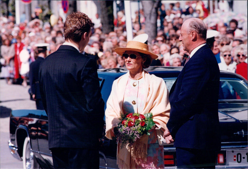 Queen Sonja and King Harald arrive at the annual music festival in Bergen. - Vintage Photograph