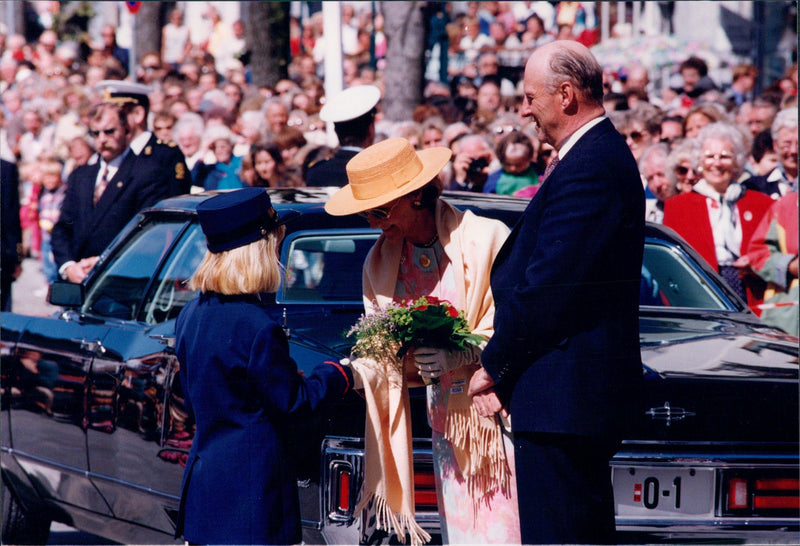 Queen Sonja and King Harald arrive at the annual music festival in Bergen. - Vintage Photograph