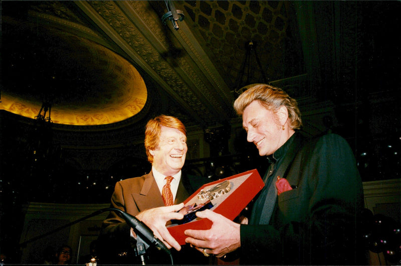 Xavier Roy and Johnny Hallyday in connection with a music gala in France. - Vintage Photograph