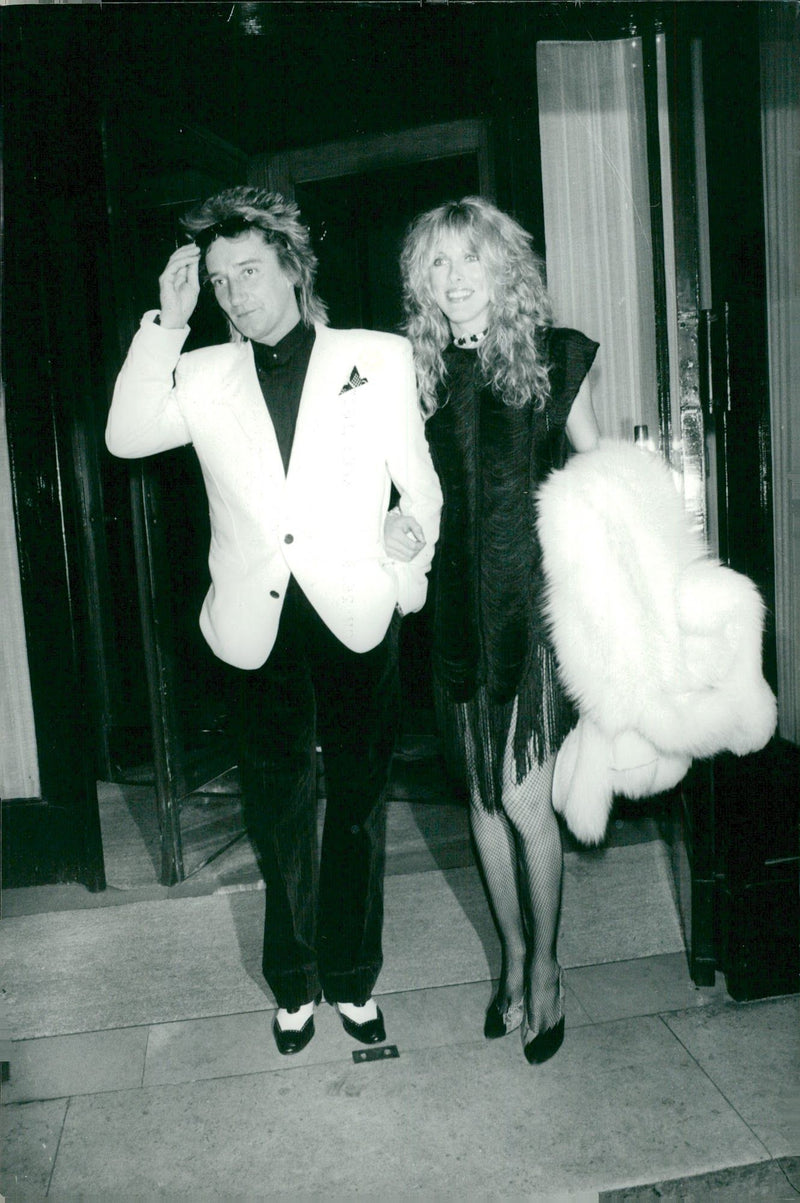 Rod Stewart and his wife Alan headed out in Paris night to celebrate his 34th birthday. - Vintage Photograph