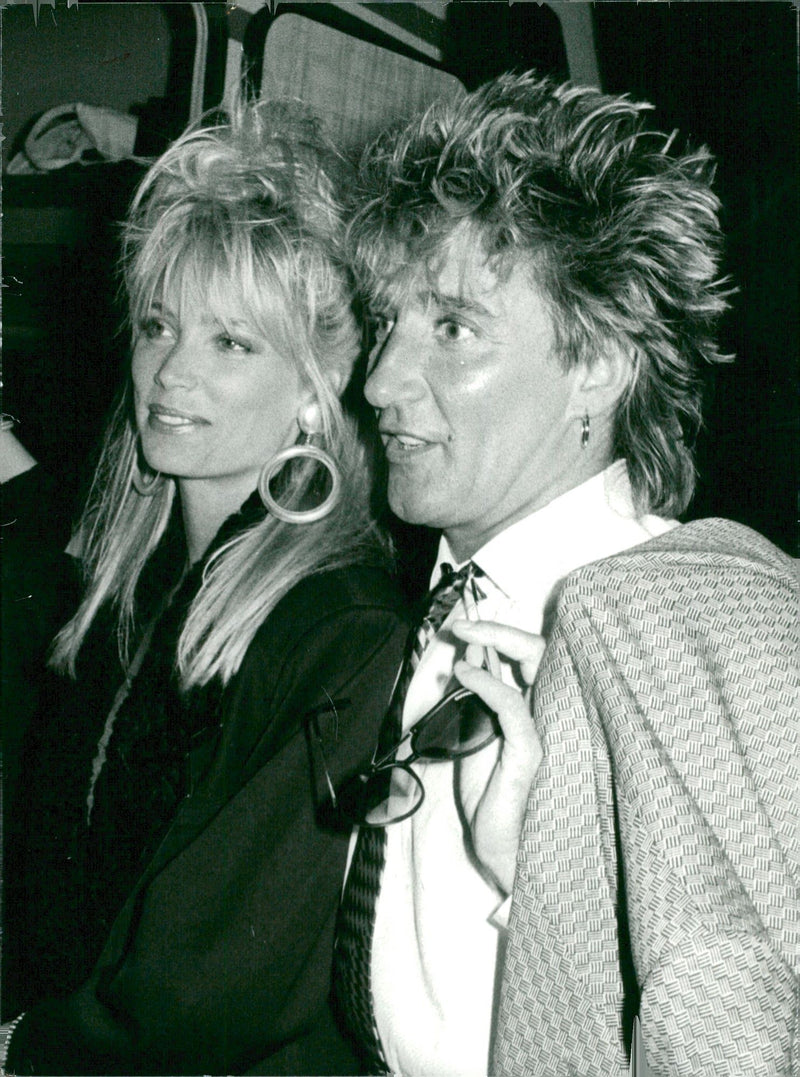 Portrait image of Kelly Emberg and Rod Stewart taken in an unknown context. - Vintage Photograph