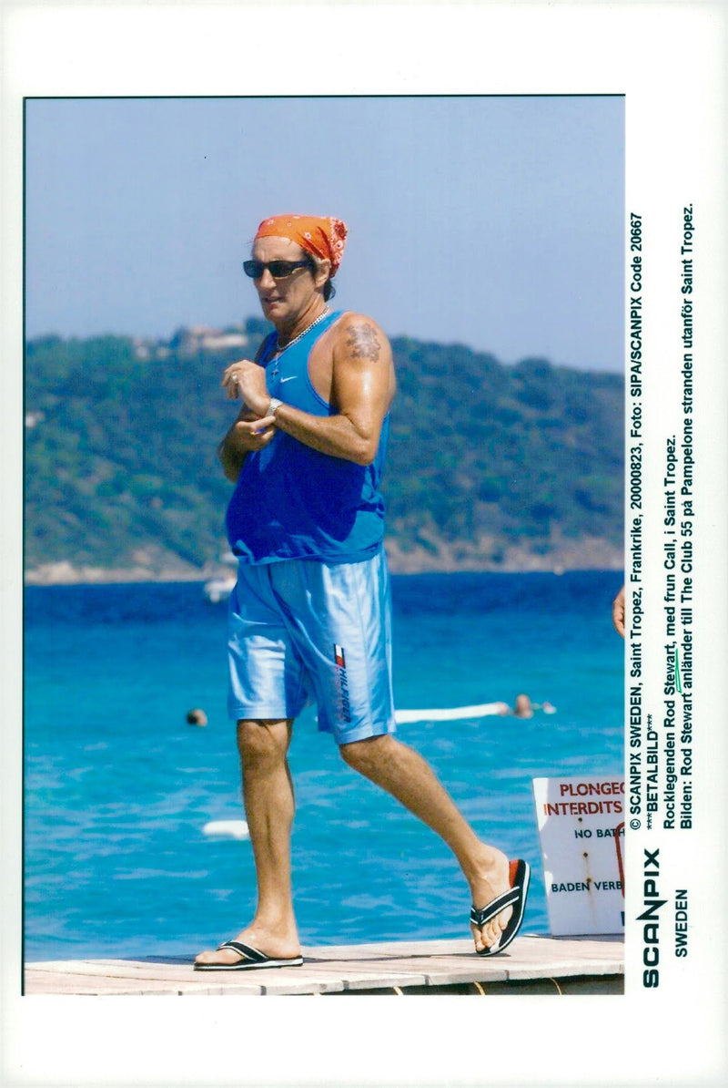 Paparazzi on Rod Stewart taken when visiting Saint Tropez. - Vintage Photograph