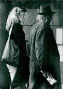 Paparzzibild on Rod Stewart and his wife Rachel Hunter on the way to the Hotel Sheraton in Gothenburg. - Vintage Photograph