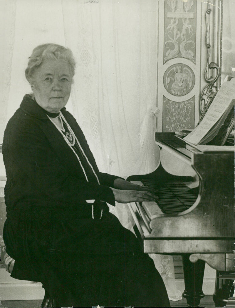 Selma LagerlÃ¶f plays the piano - Year 1935 - Vintage Photograph