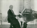 Selma LagerlÃ¶f plays the piano - Year 1935 - Vintage Photograph
