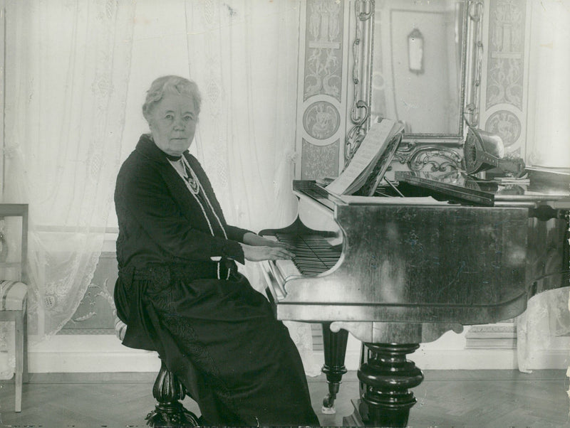 Selma LagerlÃ¶f plays the piano - Year 1935 - Vintage Photograph